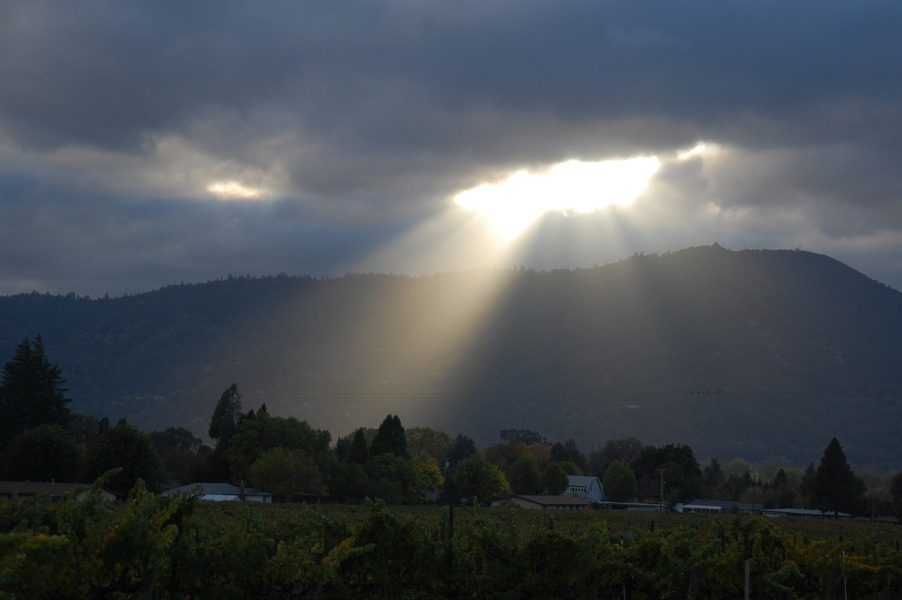 Ukiah, CA: Sunlight breaking through a storm cloud