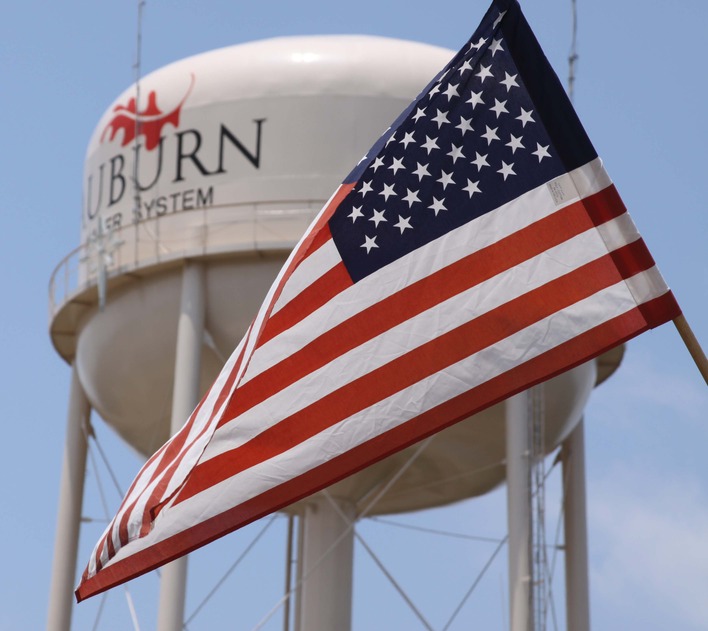 Auburn, GA: Fourth of July, flag flies near the water tower in Auburn, GA