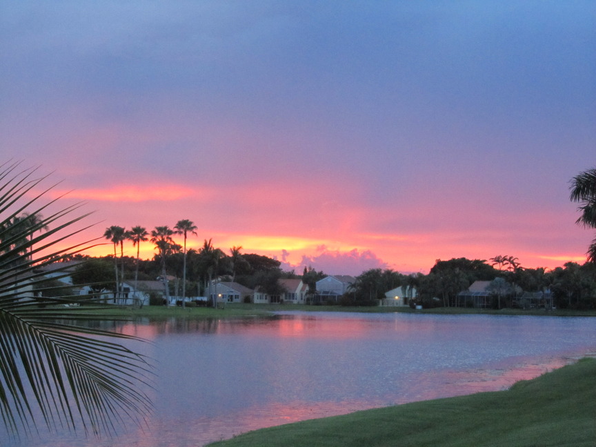 Weston, FL: August 18 Sunset following a quickly moving. glow is over the lake reach out toward the west and everglades.