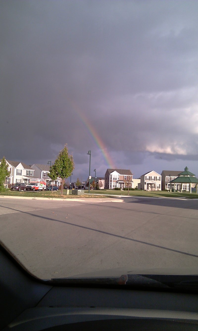 Park Forest, IL: A rainbow appears right over Victoria Circle just before it rains...