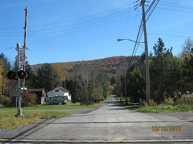 Otego, NY: view over the train tracks on River street in the village of Otego