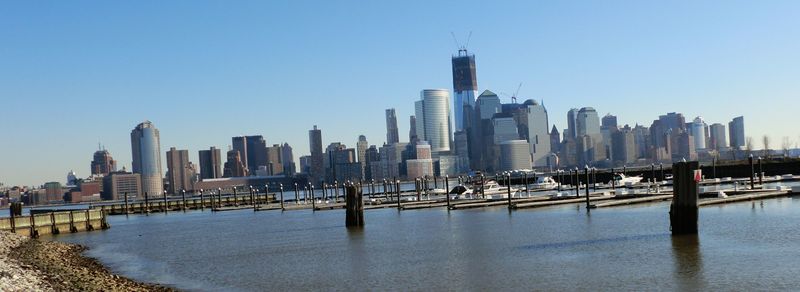 Manhattan, NY: the skyline of the finacial district of nyc - photo taken from jersey city liberty state park