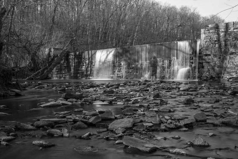 Sanatoga, PA: This photo is a long exposure of the water falling over the dam in Sanatoga Park, I used to go fishing here with my dad, the fisherman walked into the frame during the exposure creating the ghost image symbolizing my fathers passing.