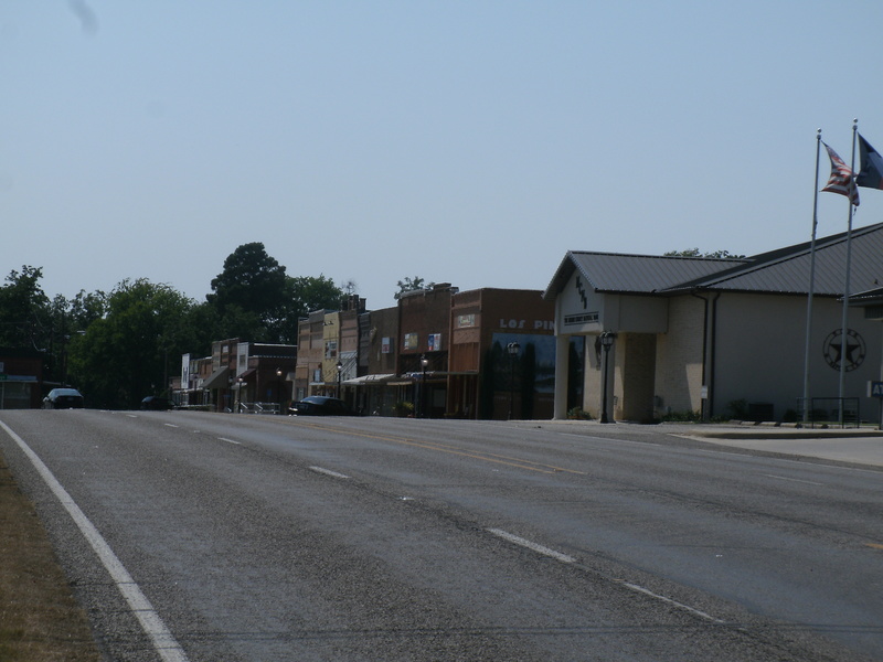 Naples, TX: US Hiway 67 and City in Background
