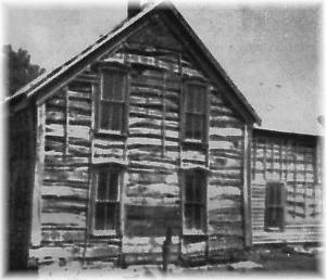 Beaver City, NE : Two-story log house from the 1880s, still standing southwest of Beaver City, Nebraska