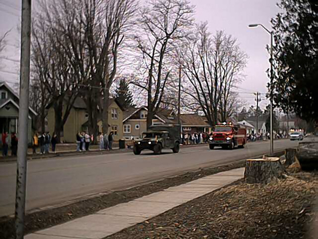 Medford, WI: 1 Picture of The 724th Engineer Battalion Leaving Town on 03/18/2003 when "Called To Duty" (Taken Along STH 64 Otherwise Known as East Broadway) (Emergency Vehicles Had To Leave The Parade To Go To A Fire East Of Town)(Sorry, No Return Pictures...Had To Work That Day)