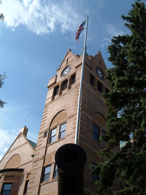 Waseca, MN: Courthouse tower, cannon & American Flag