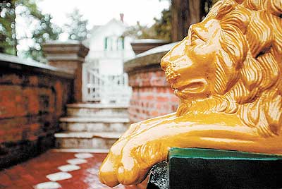 Marysville, KS: This is one of the two lion statues that guard the Koester house gates.