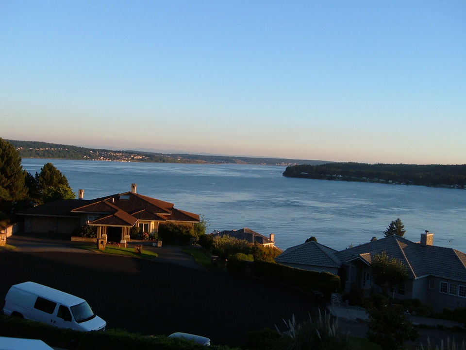 Gig Harbor, WA: Late Evening from a Gig Harbor waterfront neighborhood. University Place is across the water to the left, and Steilacoom straight out.