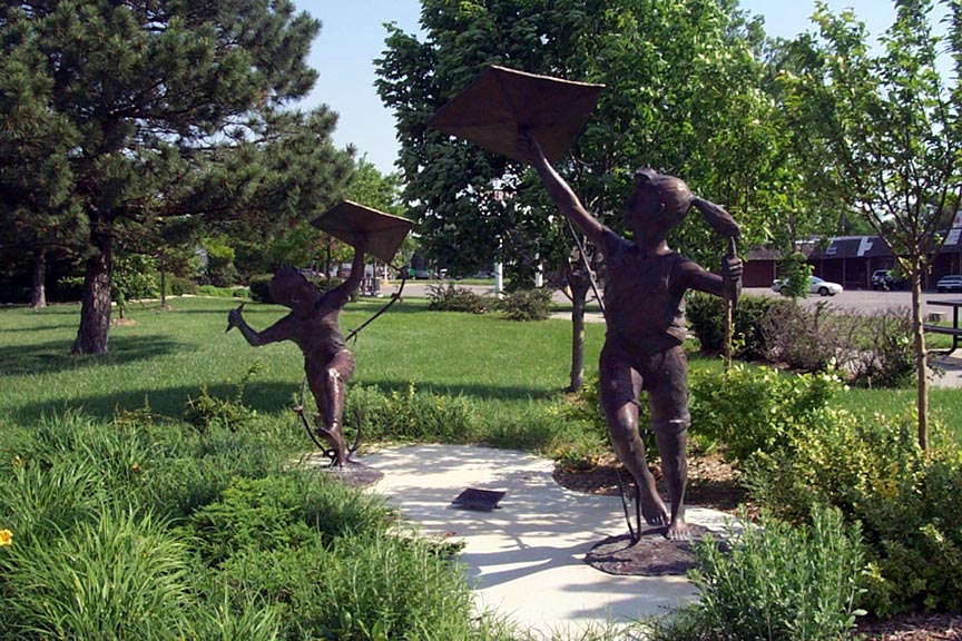 Derby, KS: "Kite Boy" and "Kite Girl" community statues
