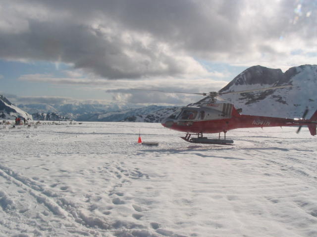 Skagway, AK : helicopter landing  at dog camp on denver glacier , skagway