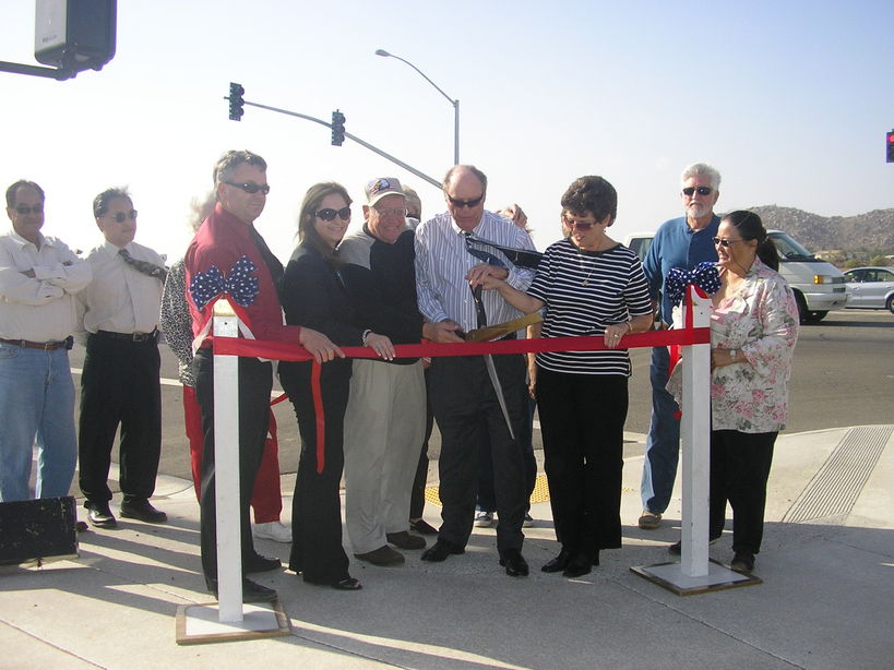 Homeland, CA : Ribbon cutting ceremony for new traffic signal Hwy 74 and Leon Rd.  Marion Ashley District 5 Supervisor, Kathi Wood Harvest Valley Community Council President holding the scissors.  April 16, 2007