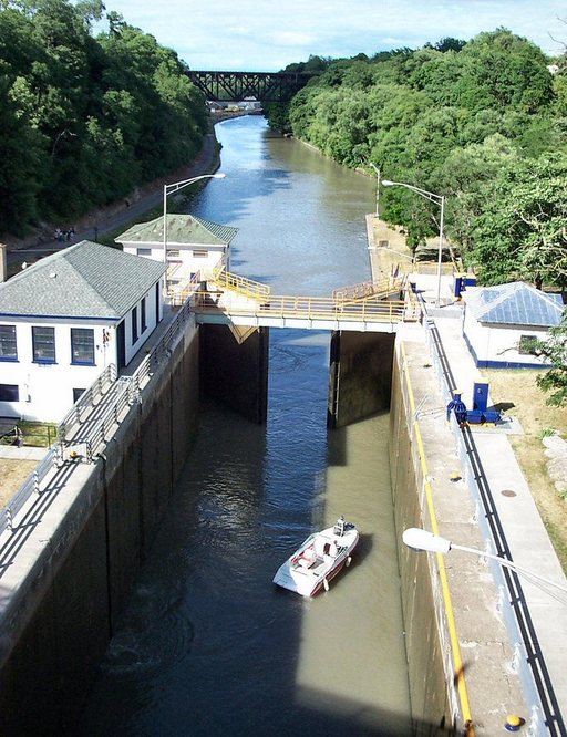 Lockport, NY: Erie Canal looking NE from Pine Street - small sport boat passing through lock