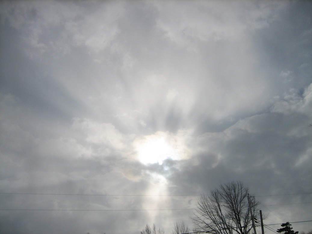 Milo, ME : cloudy sun