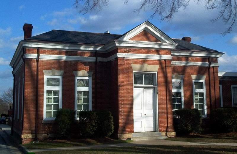 Bowling Green, VA: Caroline County Clerk's Office - Built in 1907 according to the design of Richmond architect William Callis West. It is a tall, one-story brick building with hipped roof and projecting vestibule with pedimented gable.