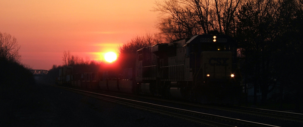 Bergen, NY : moving train at sunrise - s. lake ave