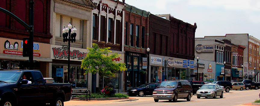 Cherokee, IA: You'll send only pennies per day when you live in Cherokee. One of the prides of this very large, small town is a store-studded main street, so full of shops that this image captures scarcely one-sixth of 'em.
