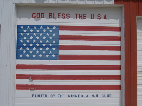 Minneola, KS : Painted Flag on Fire Dept. Door