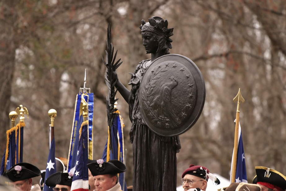 Greensboro, NC: Symbolic figure in front of NATHANAEL GREENE MONUMENT during memorial at Guilford Courthouse National Military Park Greensboro NC March 2008