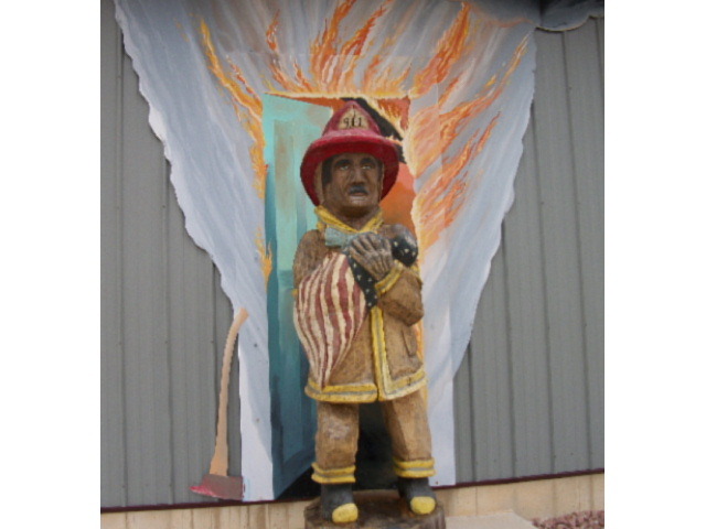 Mulberry Grove, IL: This statue is in front of the Mulberry Grove Fire House