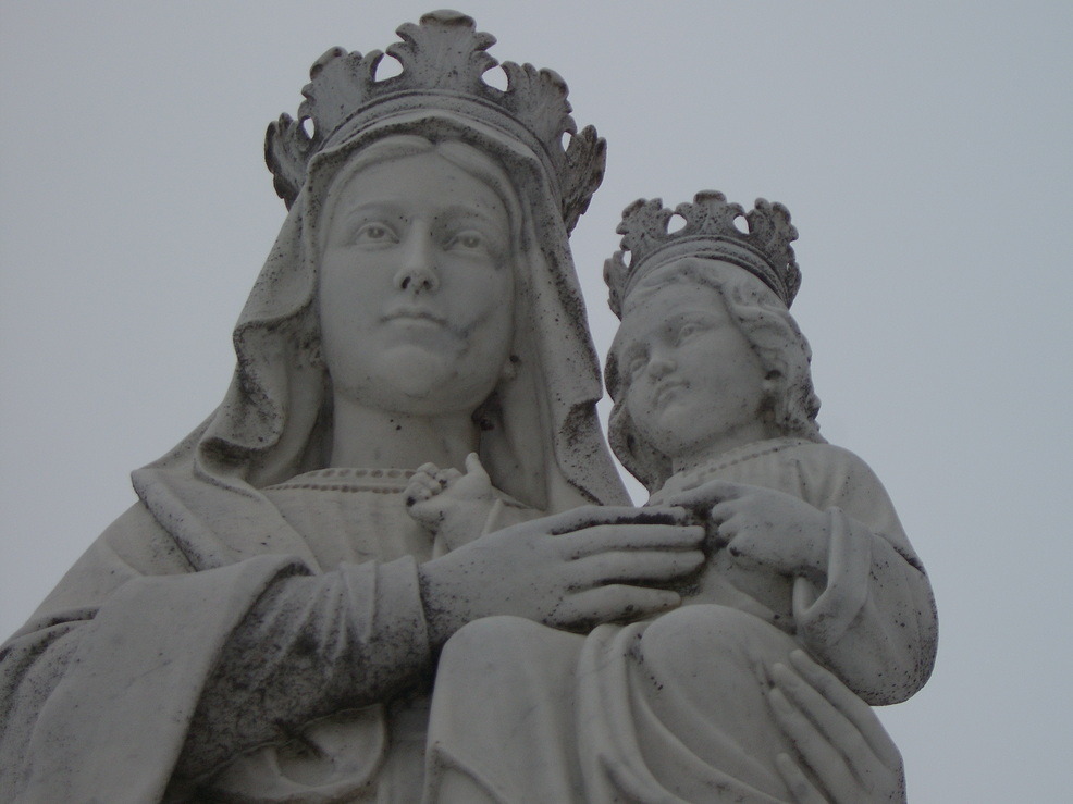 Watertown, NY: Mary of christian faith holding baby jesus