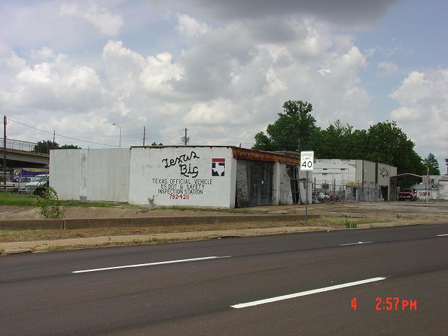 Texarkana, TX: Another building just west of State Line ave., on 7th St. Notice the stretch of buildings, all abandoned.
