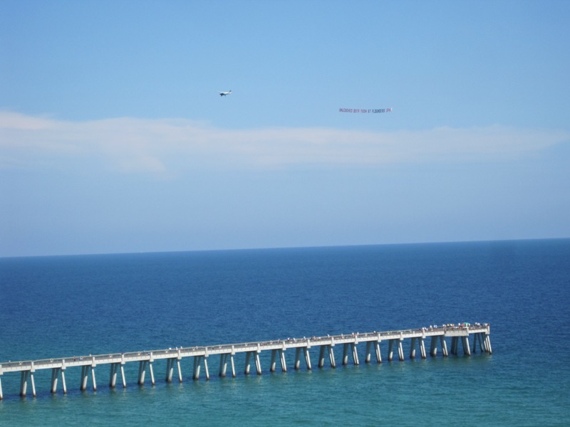 Gulf Breeze, FL: Banner tow over Navarre Beach Pier - Gulf of Mexico Navarre Beach FL
