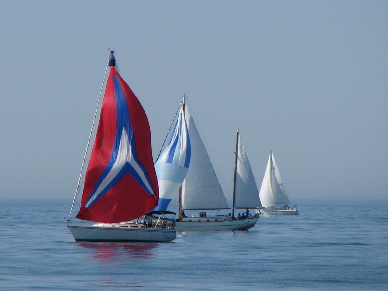 Holland, MI Sailboats coming into the Holland port after a day of
