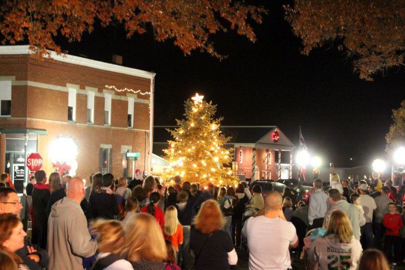 Smithville, MO: Crowd's gathered in the Heritage District for Mayor's Christmas tree lighting