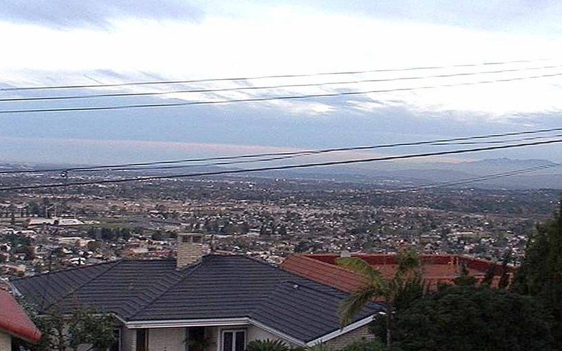 Tustin Foothills, CA: View North. Orange is in the foreground. Mt Wilson in the Angeles Forest is directly ahead.