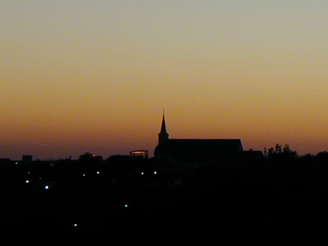 Allen, TX: The east (downtown) skyline at dusk, taken from the hill of a school.