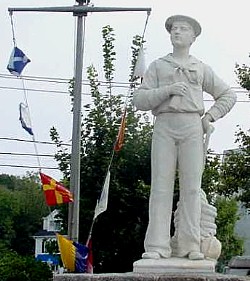Port Jefferson, NY: "The Mariner" statute greets visitors arriving in Port Jefferson Harbor by ferry.