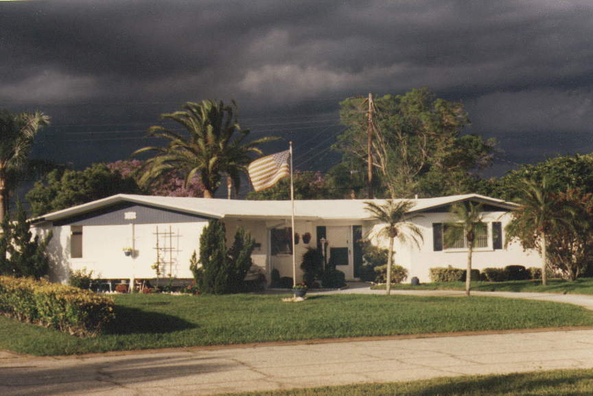 Kensington Park, FL: Typical Kensington Park home with approaching storm