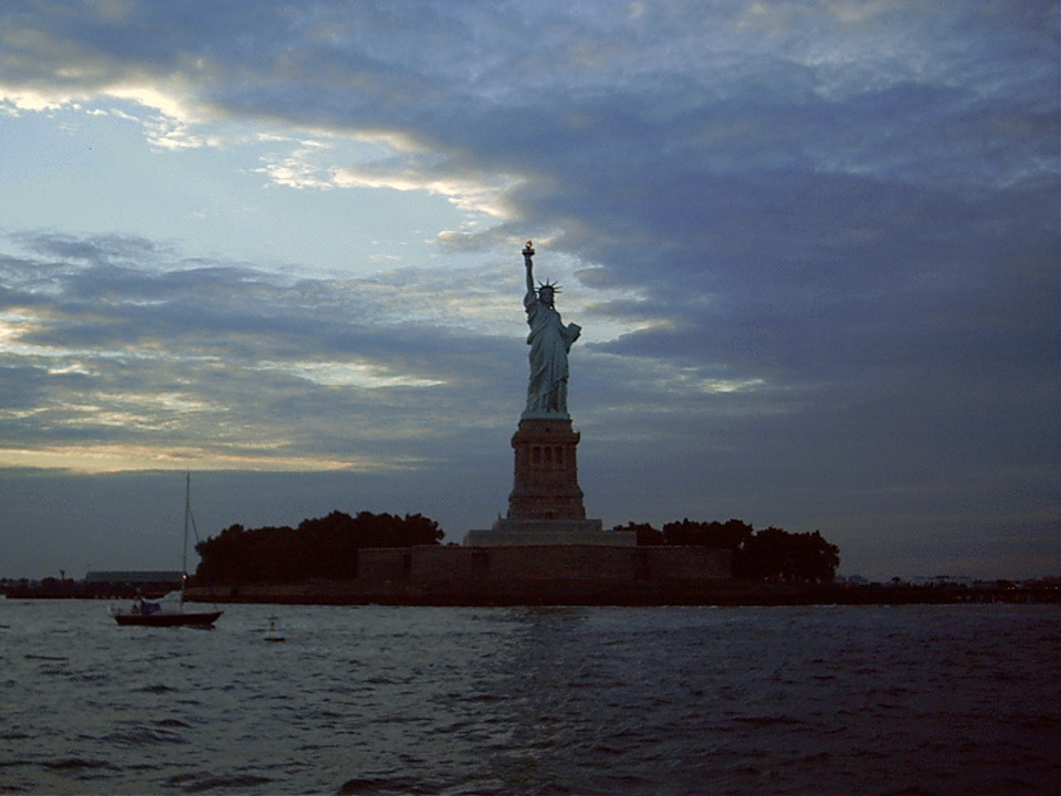 New York, NY: The statue of liberty at dusk