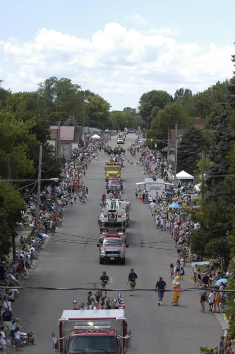 Elysian, MN: Main street in Elysian, MN during the 4th of July parade