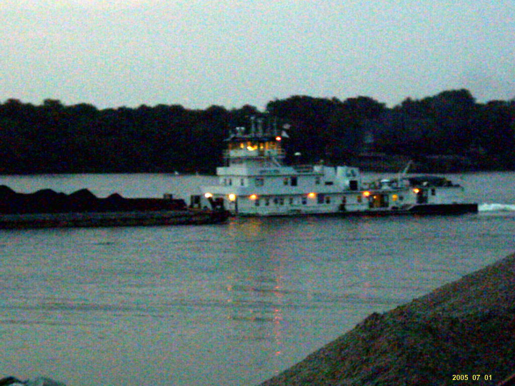 Utica, IN: Utica Barge going down the Ohio River
