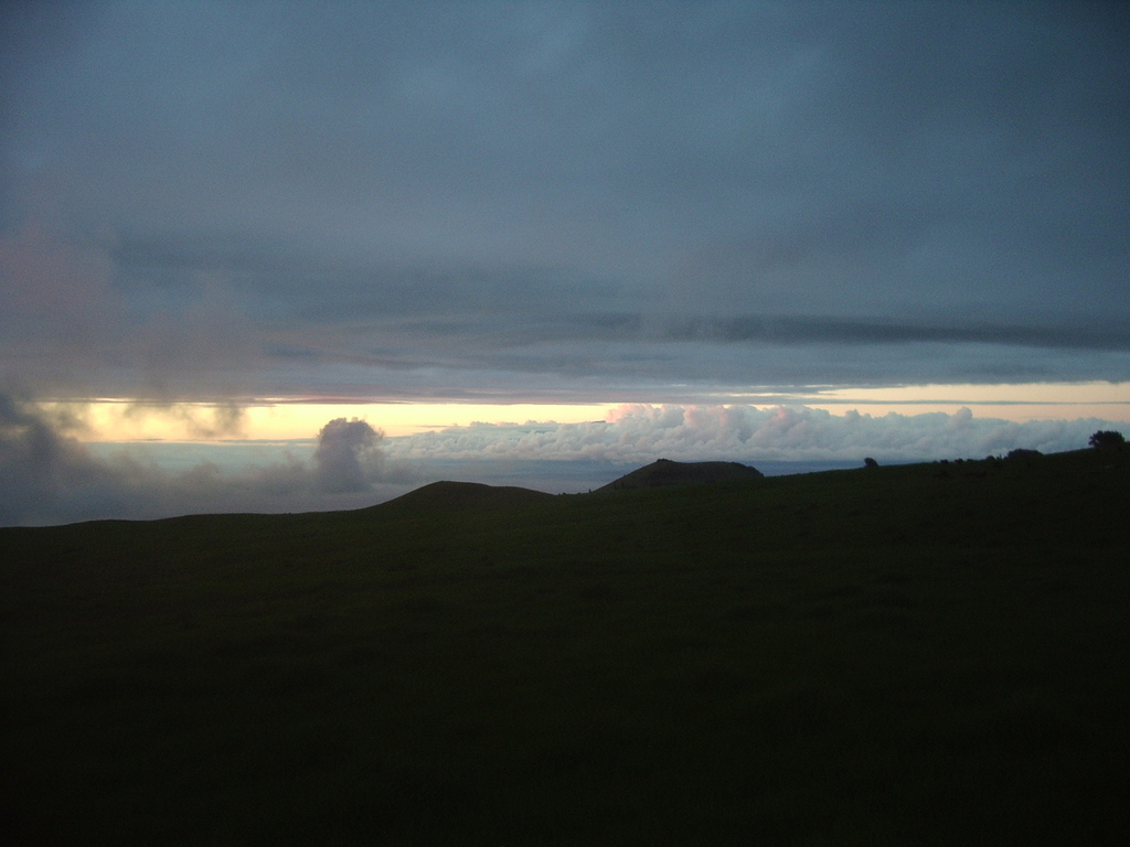 Waipio, HI: Waipio, Maui covered by clouds in distance