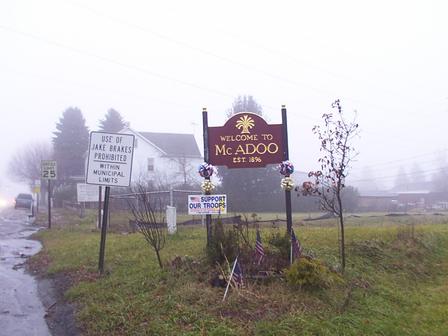 McAdoo, PA: Welcome sign to McAdoo, Pennsylvania on a rainy, foggy day.