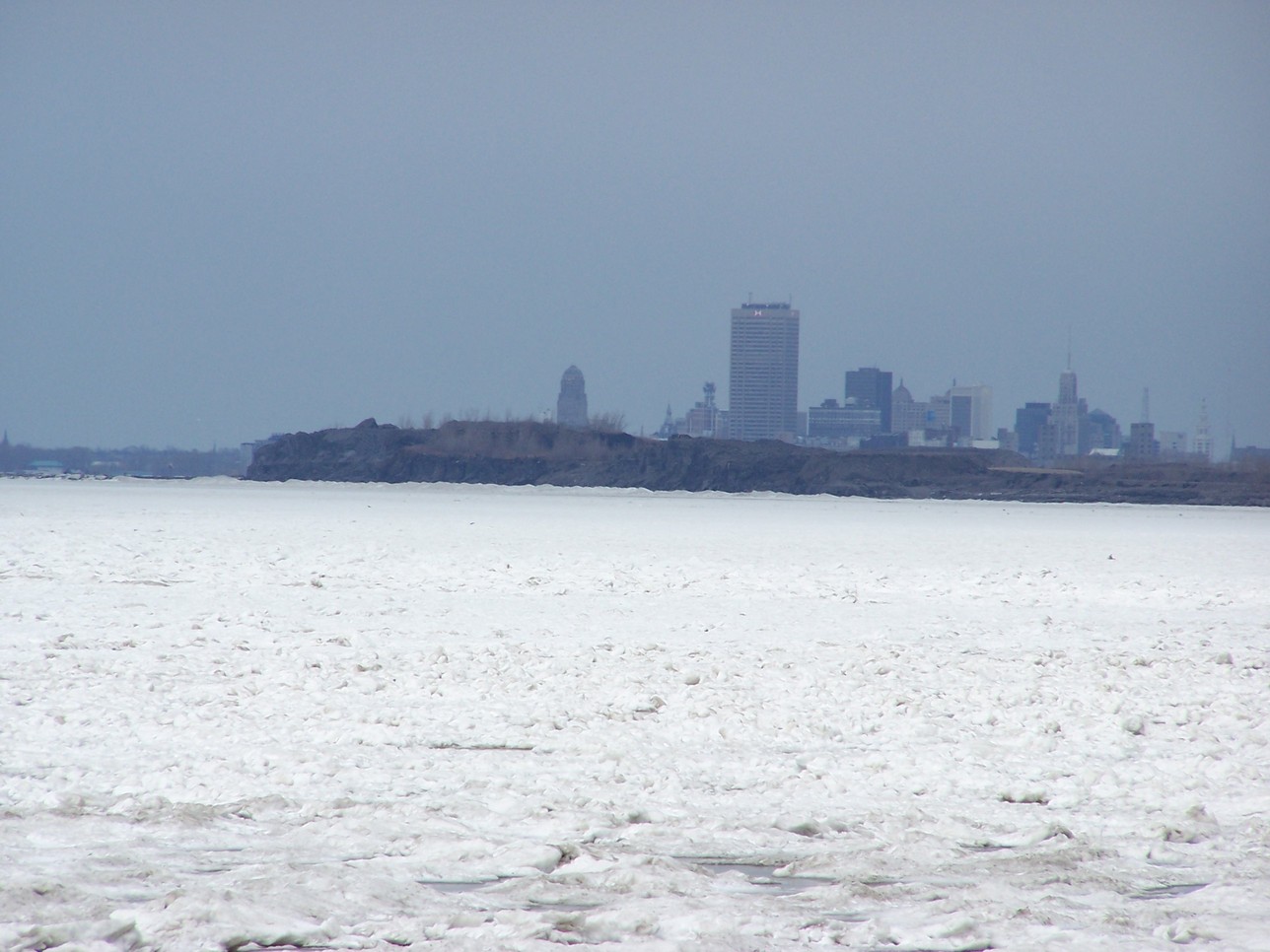 Buffalo, NY: The Buffalo Skyline across a cold lake.