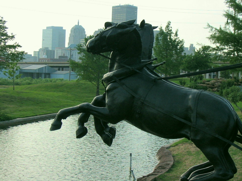 Oklahoma City, OK: Horses of the Oklahoma Land Run Monument, with downtown in the background