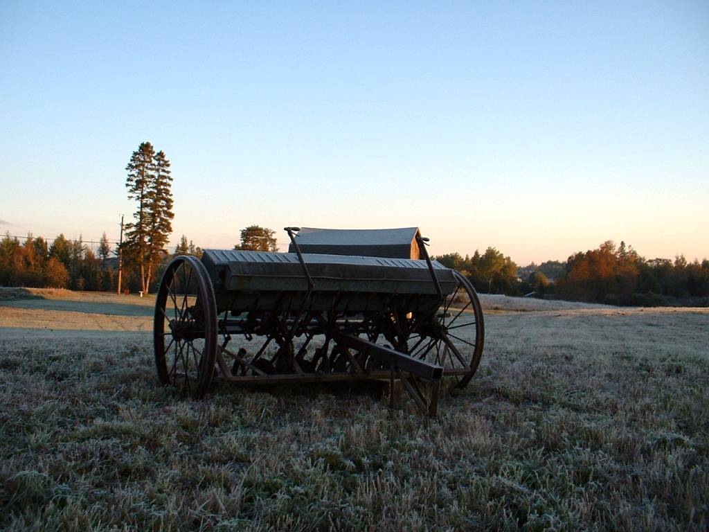 Sherman, ME: Seed Spreader and Barn at Sunrise Sherman Maine