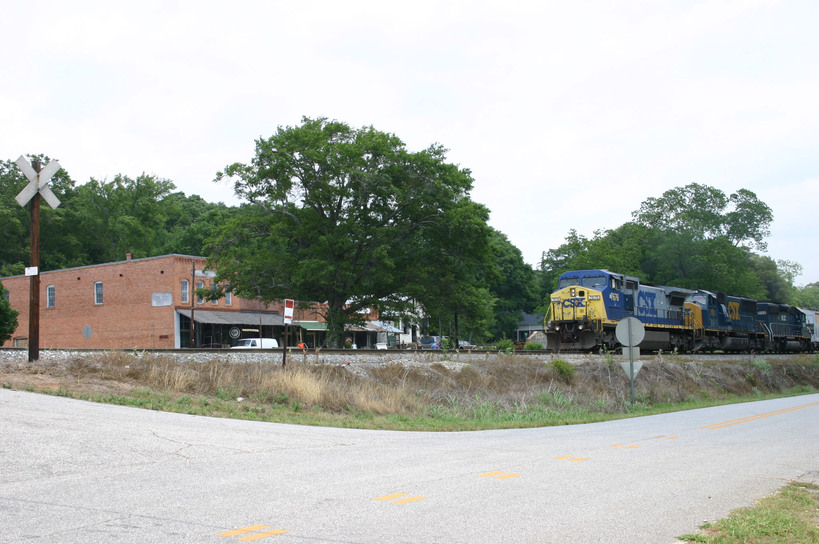 Carlton, GA: Main Street - with CSX train passing through town