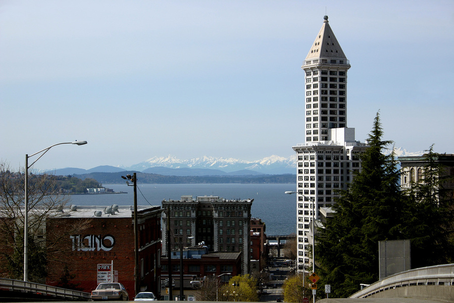 Seattle, WA: Looking West on Yesler Ave. Olympic Mountains and Smith Tower.