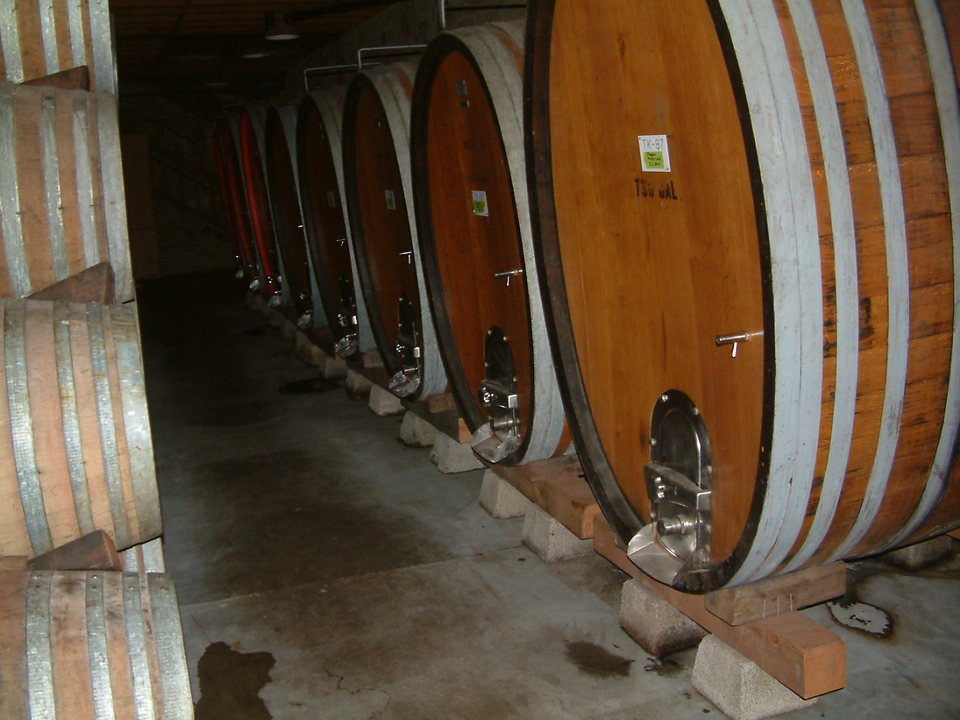 St. Helena, CA: Wine barrels in a winery in St. Helena