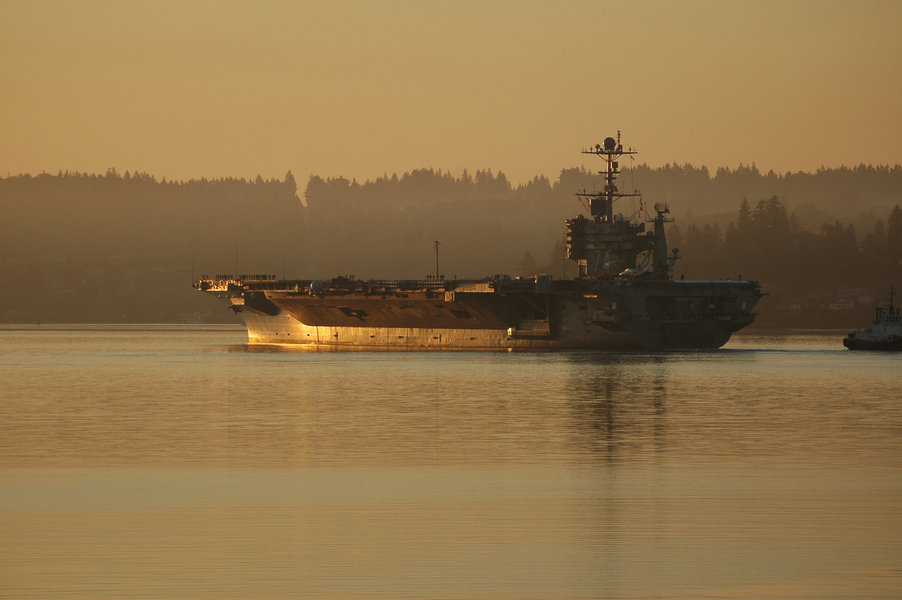Bremerton, WA: Aircraft Carrier Heading out to sea.