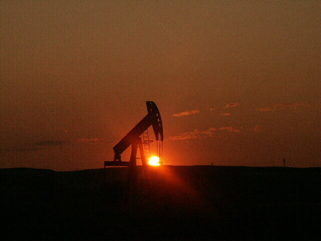 Sidney, MT: One of our many oil rigs at sunset.