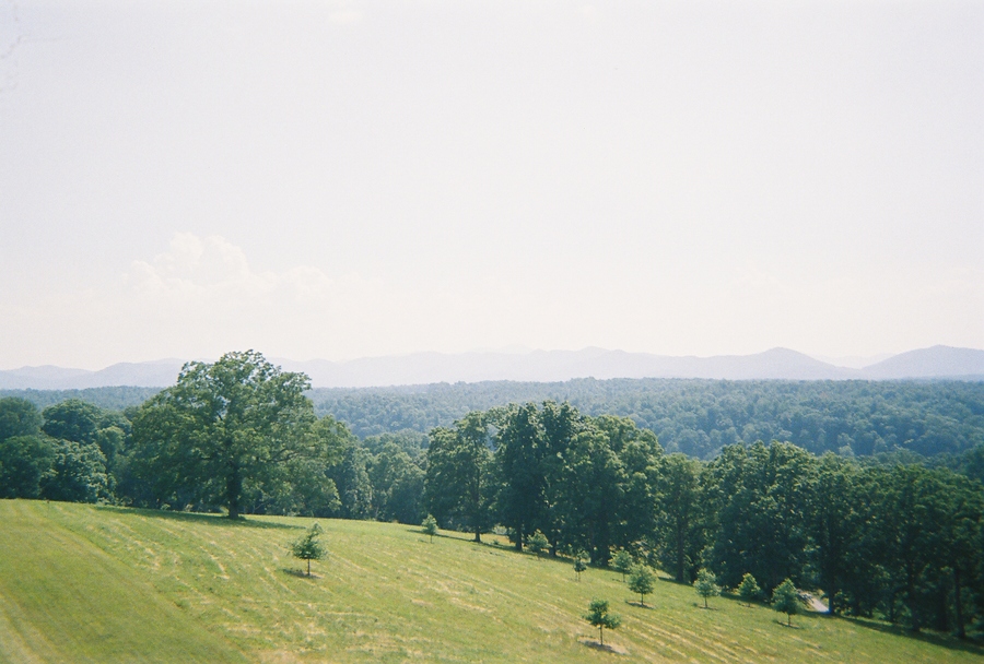 Asheville, NC: Asheville, NC - A View Of The Blue Ridge Mountains And Biltmore Forest Behind Biltmore Estate.