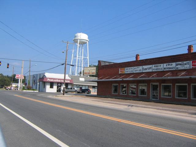 Malone, FL: Old building and water tower, downtown Malone
