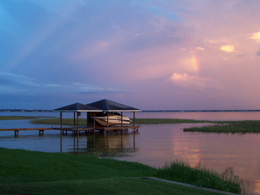 Lake Placid, FL: Sunset with Rainbow over Lake June in Winter