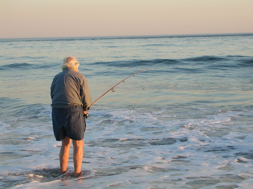 Westport, MA: Man Fishing at Cherry & Webb Beach